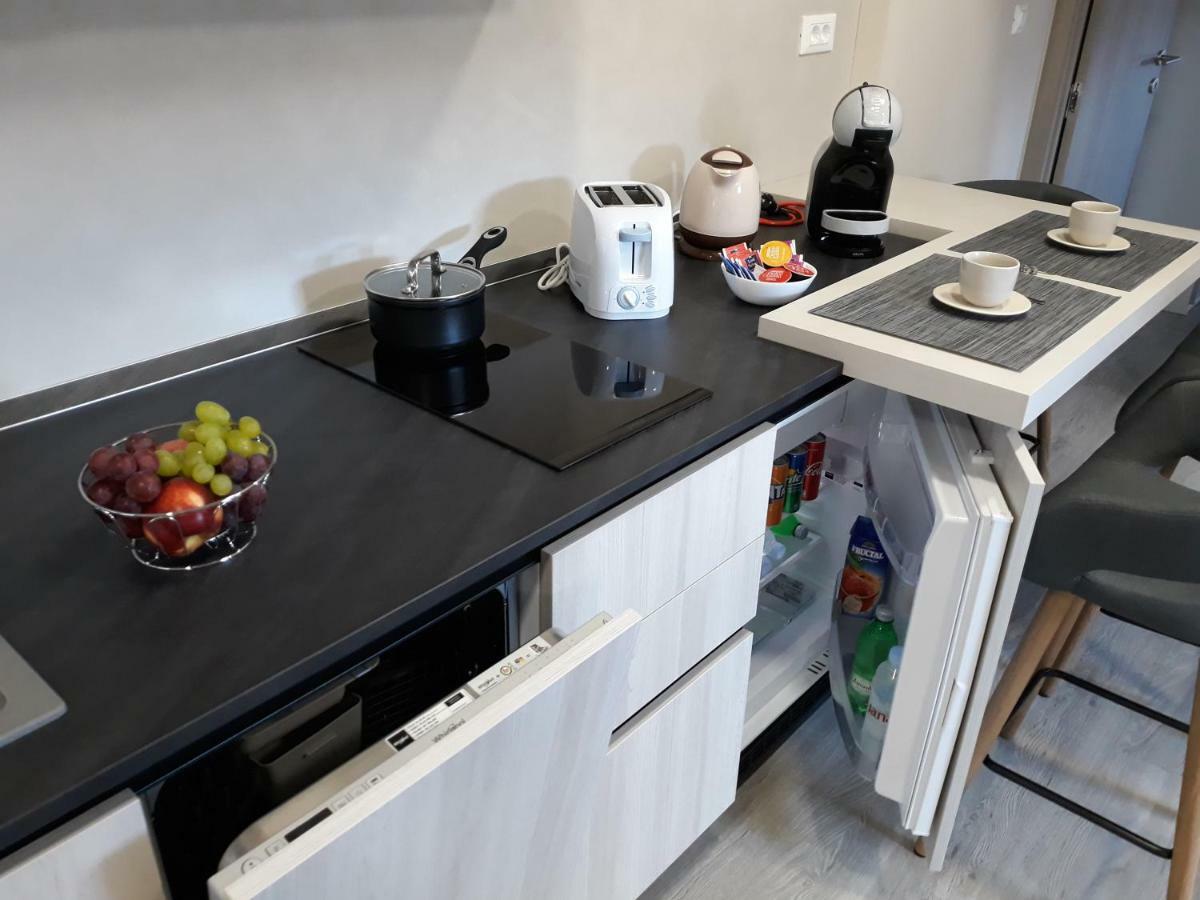 PUY Center Apartment Dalu מראה חיצוני תמונה